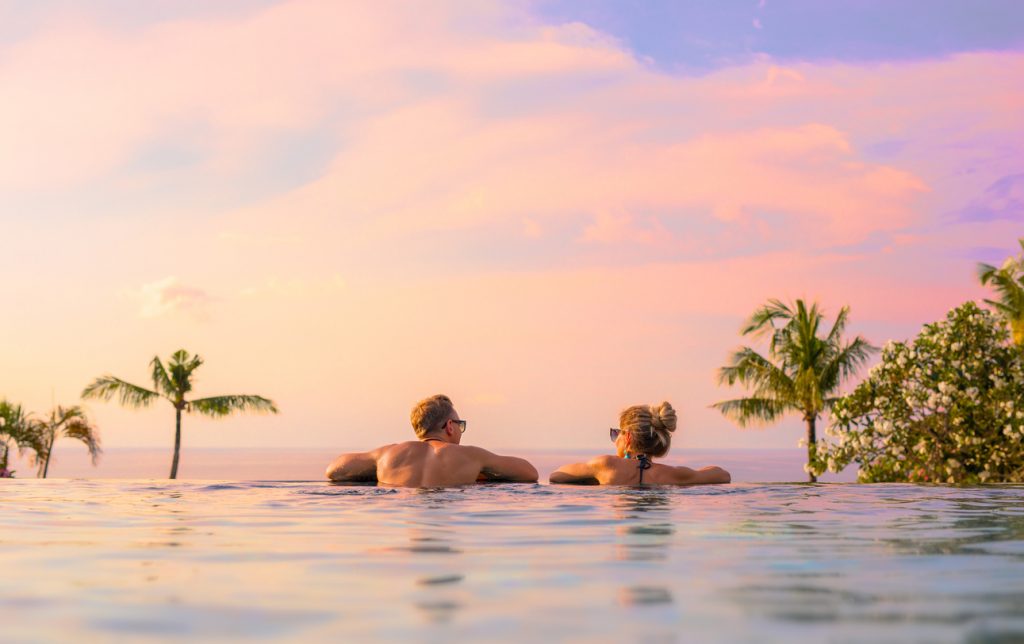 Couple looking at a beautiful sunset