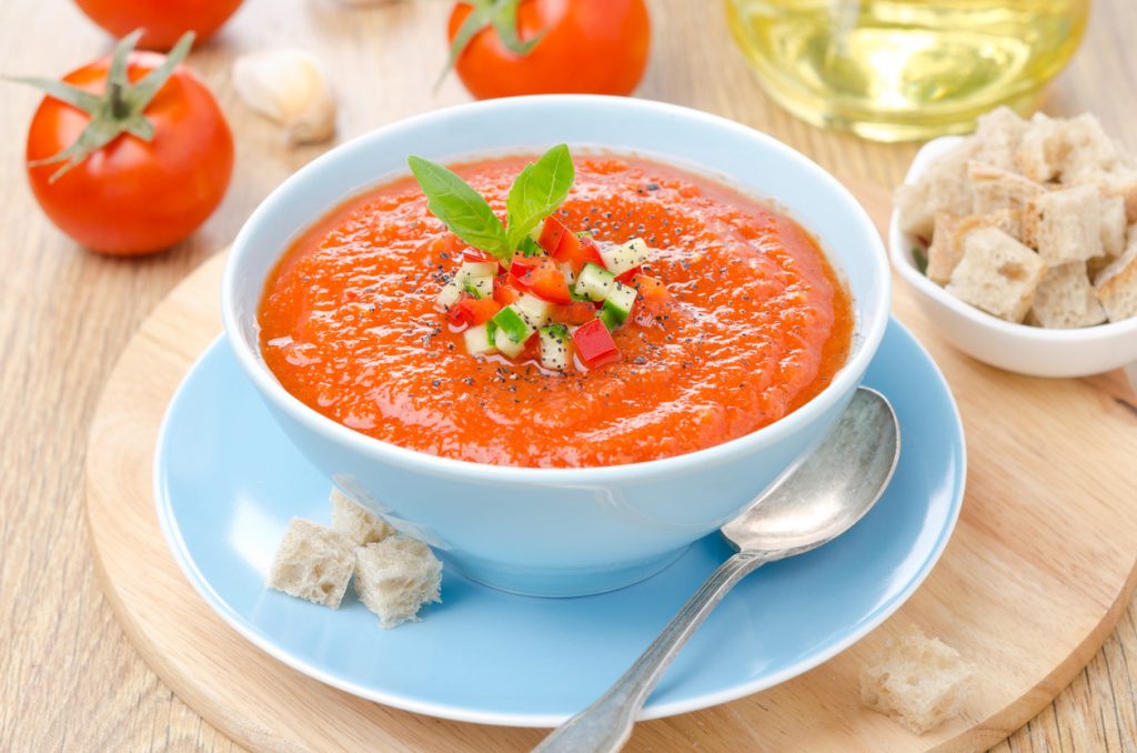 Cold tomato soup Gazpacho with basil and croutons