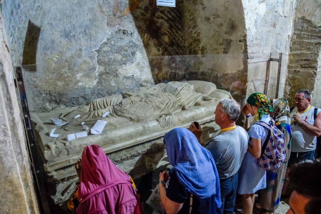 Pilgrims near the sarcophagus of St. Nicholas in Demre, Turkey.