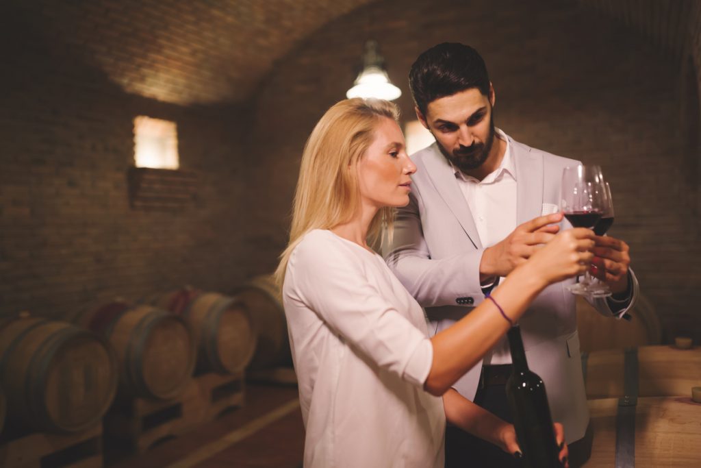 Tasting wine in winery basement