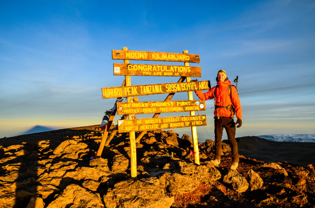 Hiker at Uhuru Peak, Kilimanjaro - Tanzania, Africa