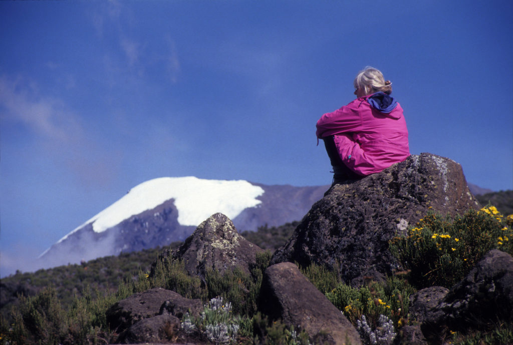 Tourist watching Mount Kilimanjaro the highest point in Africa,