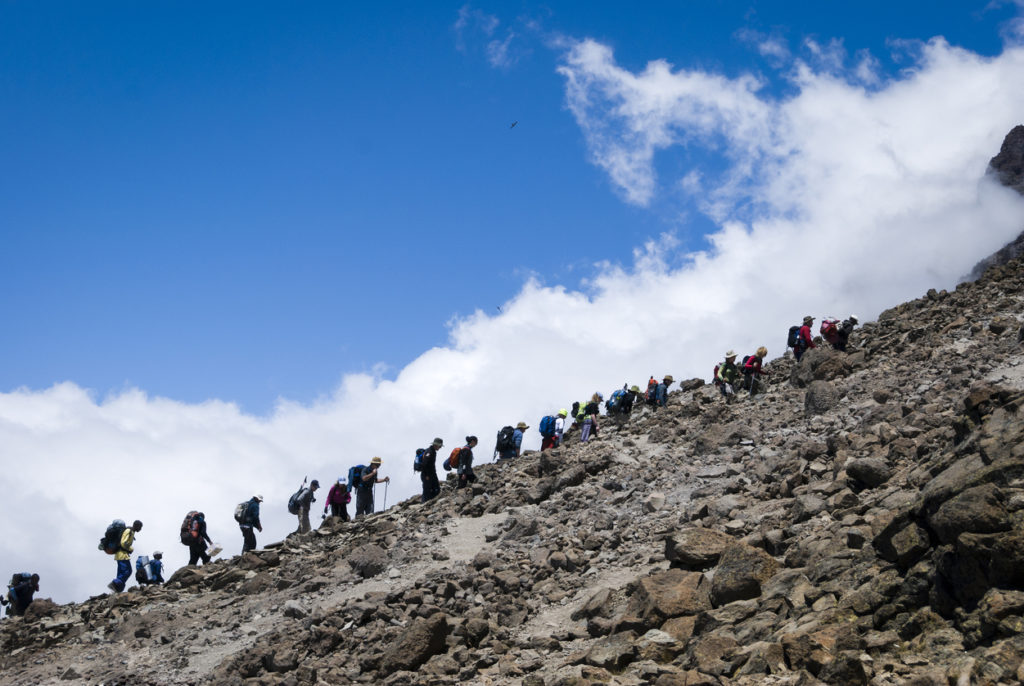 Trekkers arriving at Base Camp, Mt Kilimanjaro, Tanzania