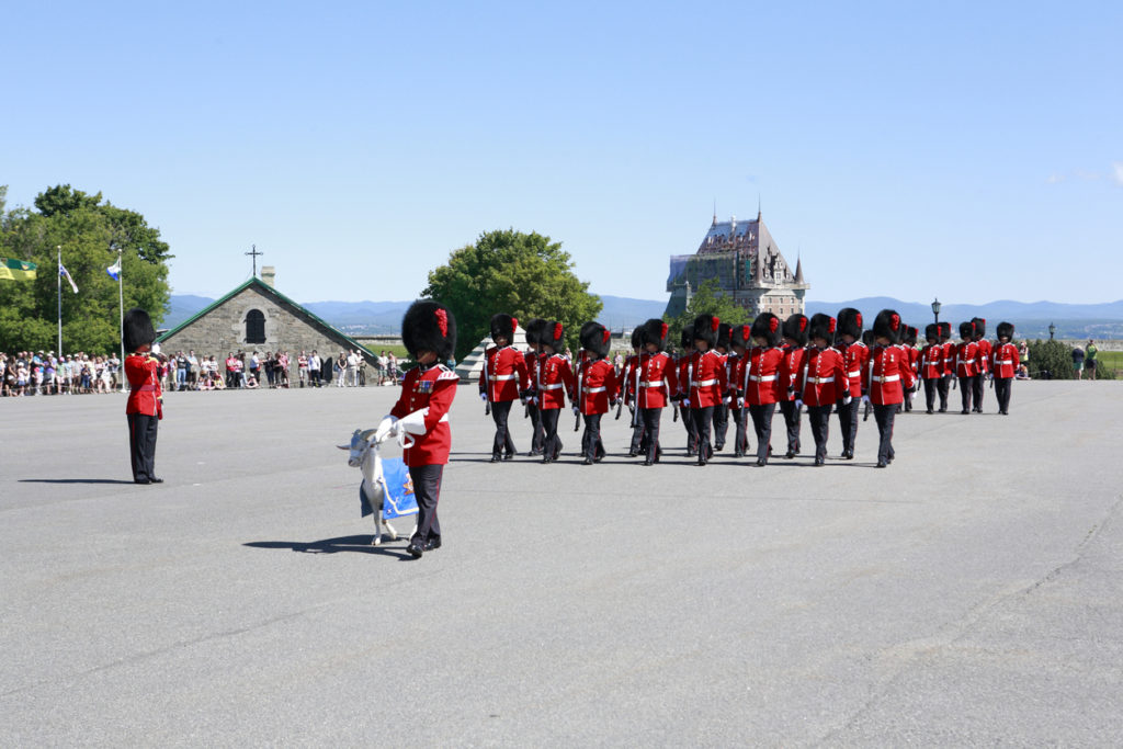 he Canadian soldiers from Royal 22e Regiment are having the traditional Changing of Guard ceremony in the historical La Citadelle