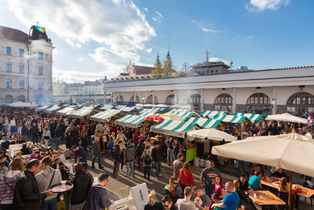 Enjoying outdoor street food festival in Ljubljana, Slovenia