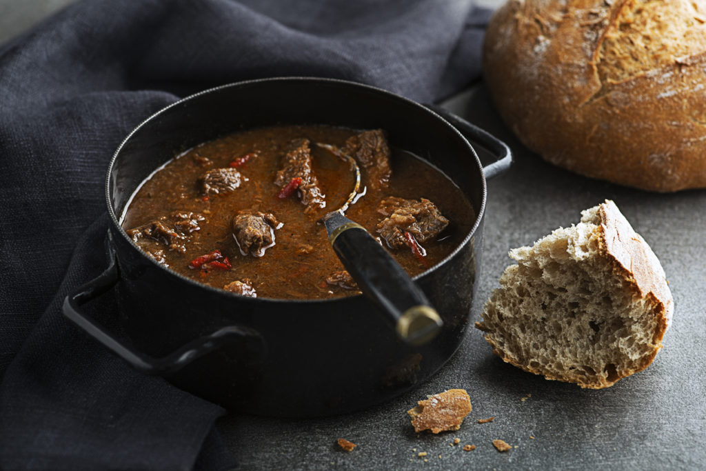 Portion of traditional Beef stew - goulash with bread