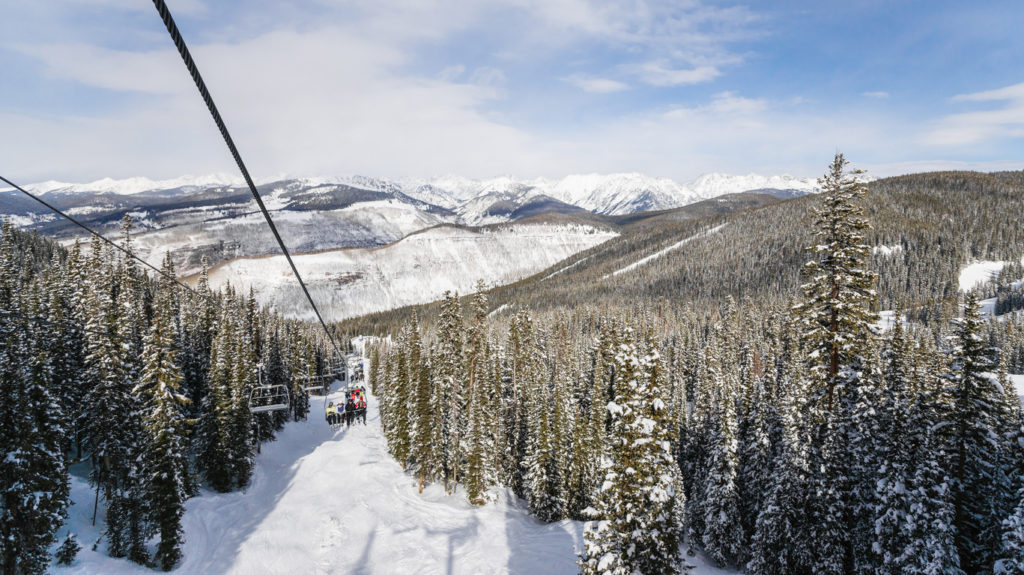 Ski Lift with Skiers in Vail, Colorado