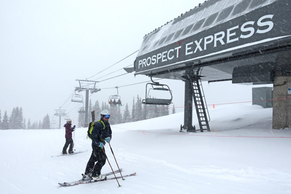 Skiers Waiting Under the Prospect Express Chair Lift at Telluride Ski Resort