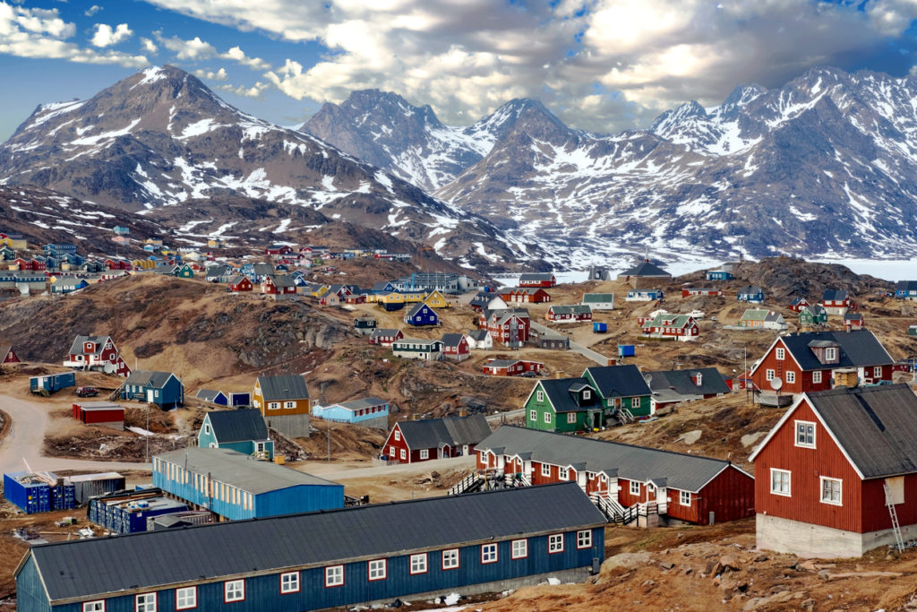 Tasiilaq, a town surrounded by high mountains in Eastern Greenland