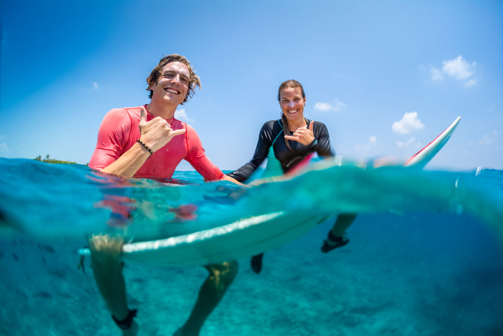 Happy surfers in the Maldives