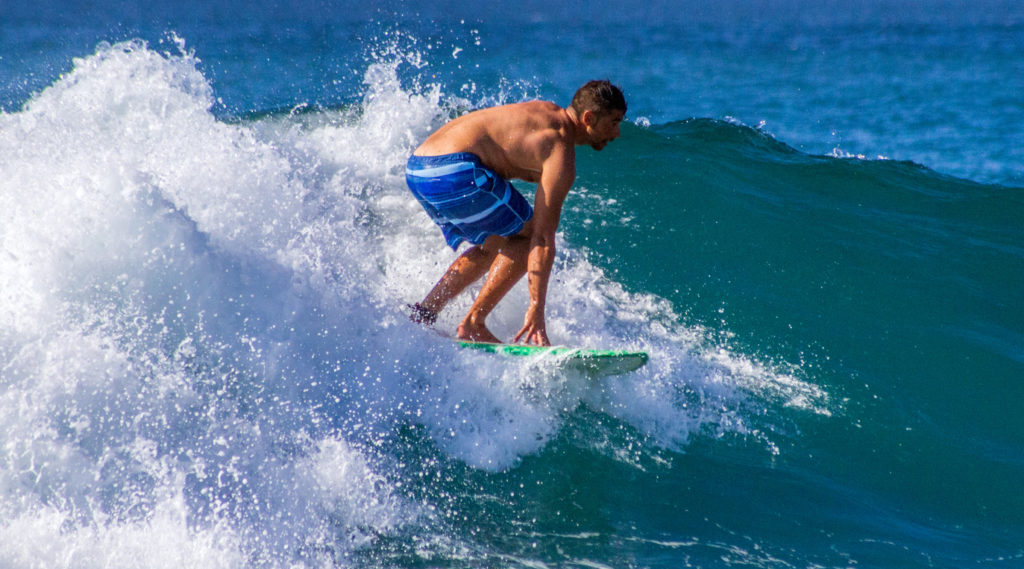 Catching a nice wave in Playa De Las Americas, Tenerife