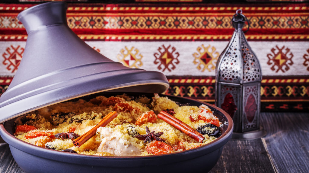 Traditional moroccan tajine of chicken with dried fruits