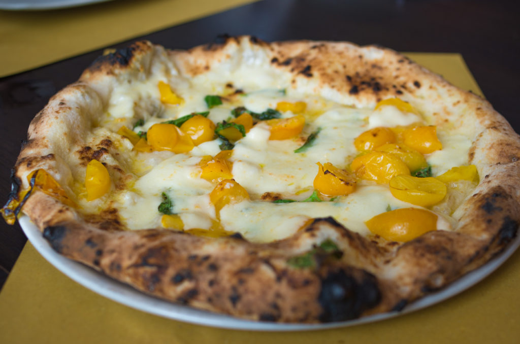 Neapolitan pizza with yellow tomato