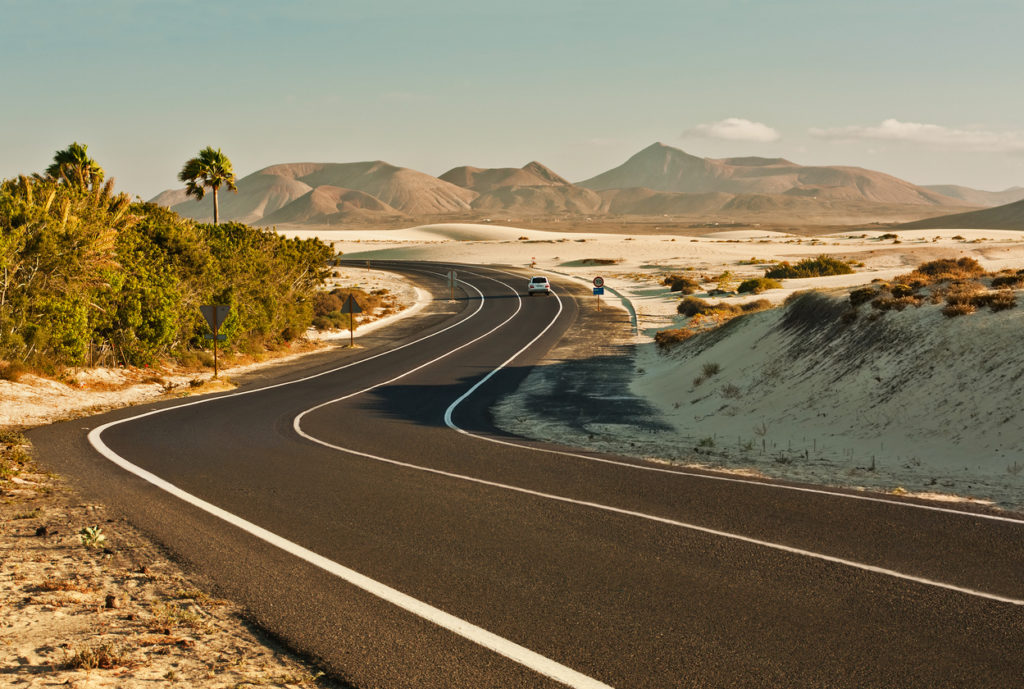 Winding road across the dunes of Corralejo, Fuerteventura