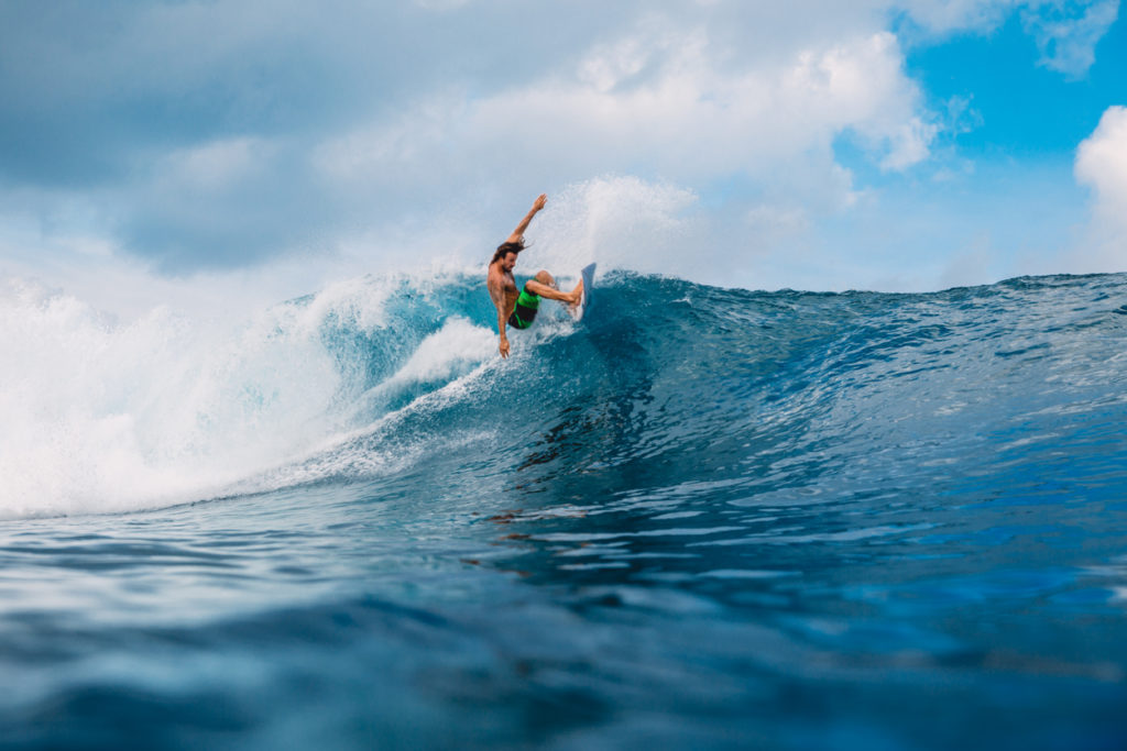 Surfer hits the lip at Uluwatu