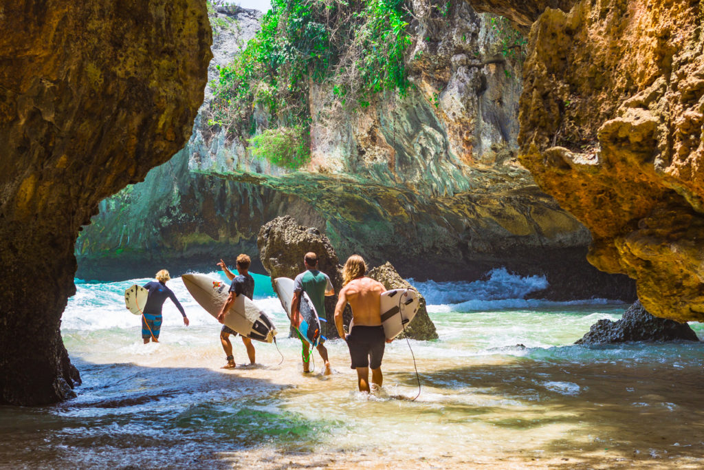 Surfers at Balangan beach, Bali