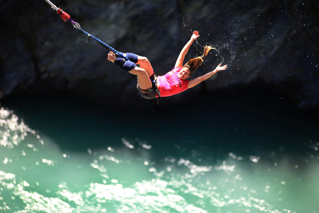 A woman bungy jumping off Kawarau bridge in Queenstown, New Zealand.