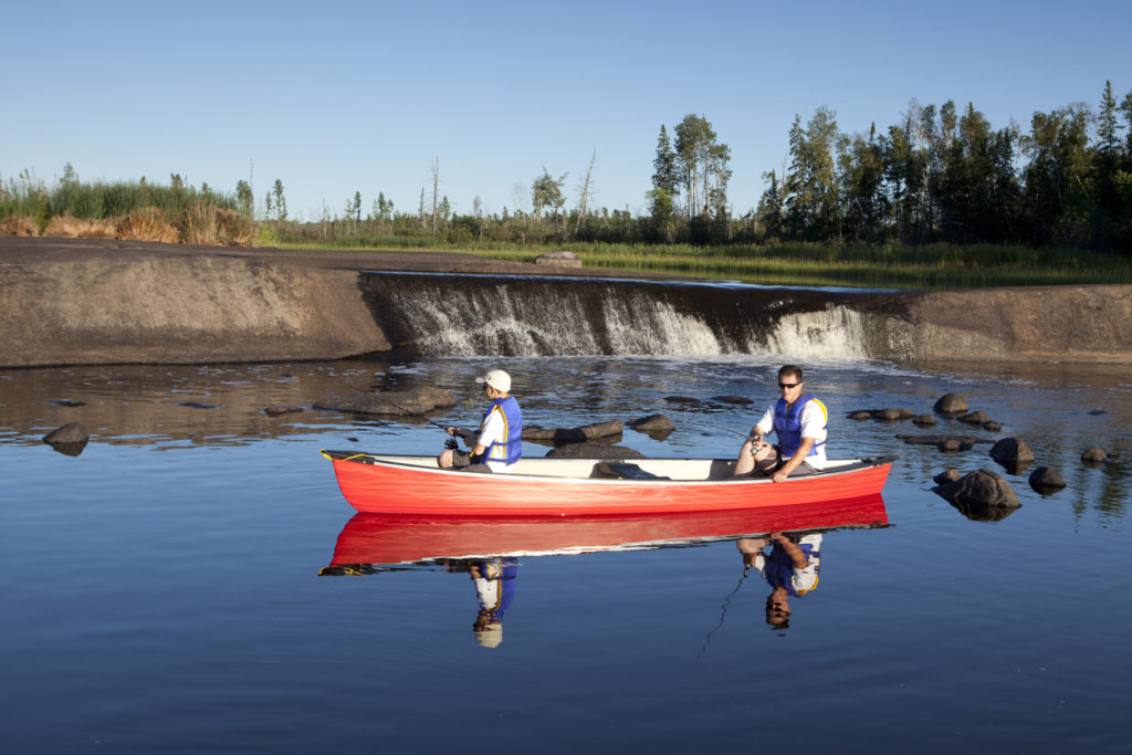 Fishing at Rain Bow Falls Manitoba, Canada.