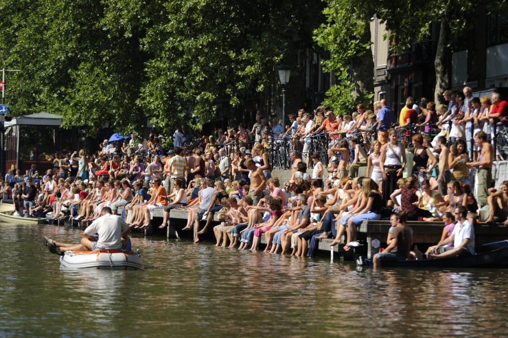 Audiences at a music events on the water named Grachtenparade (Canal parade), Utrecht.