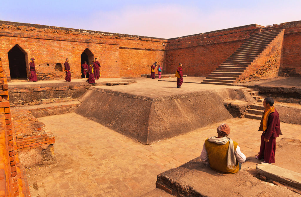 Buddhist pilgrims in the ancient Buddhist university Nalanda, India.