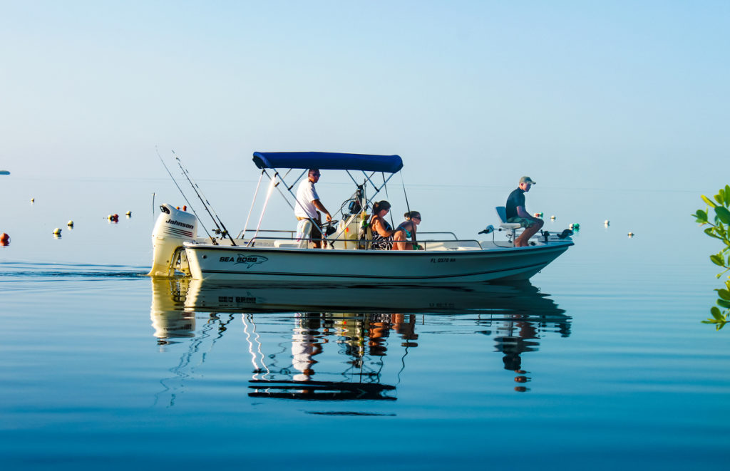 Family fishing off Cudjoe Key, Florida, USA.