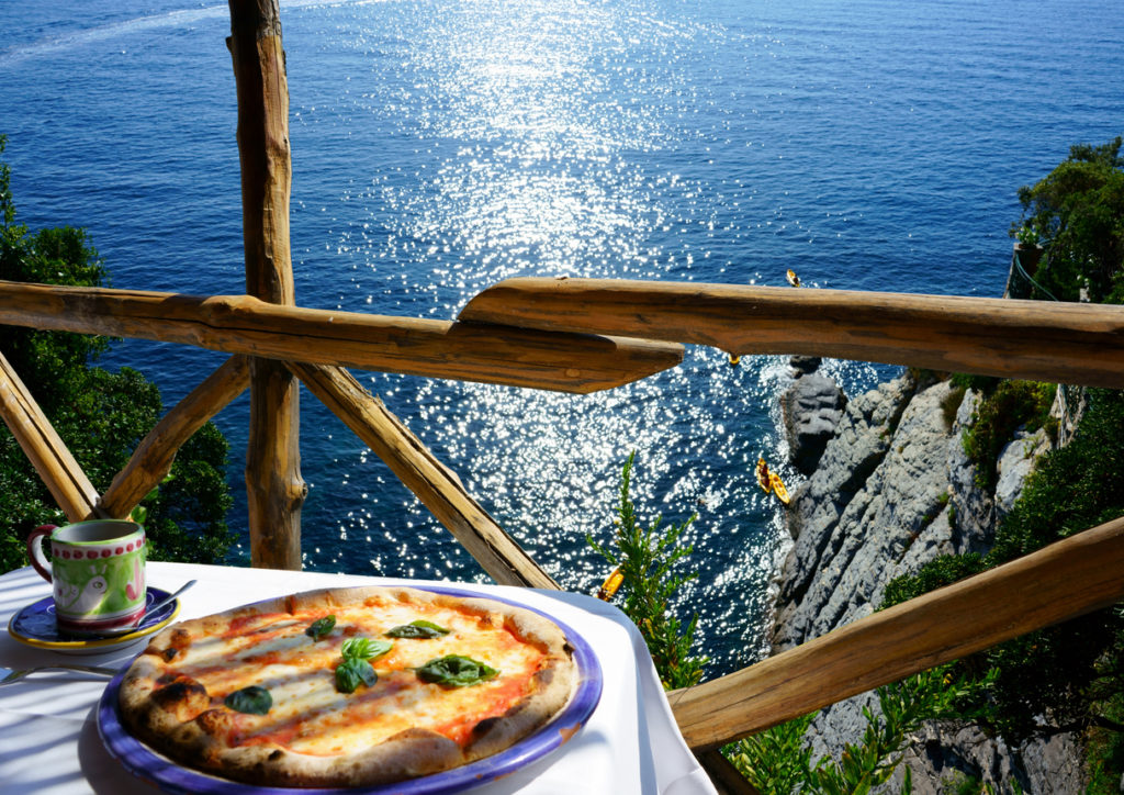 Pizza place terrace overlooking to seafront of Portofino