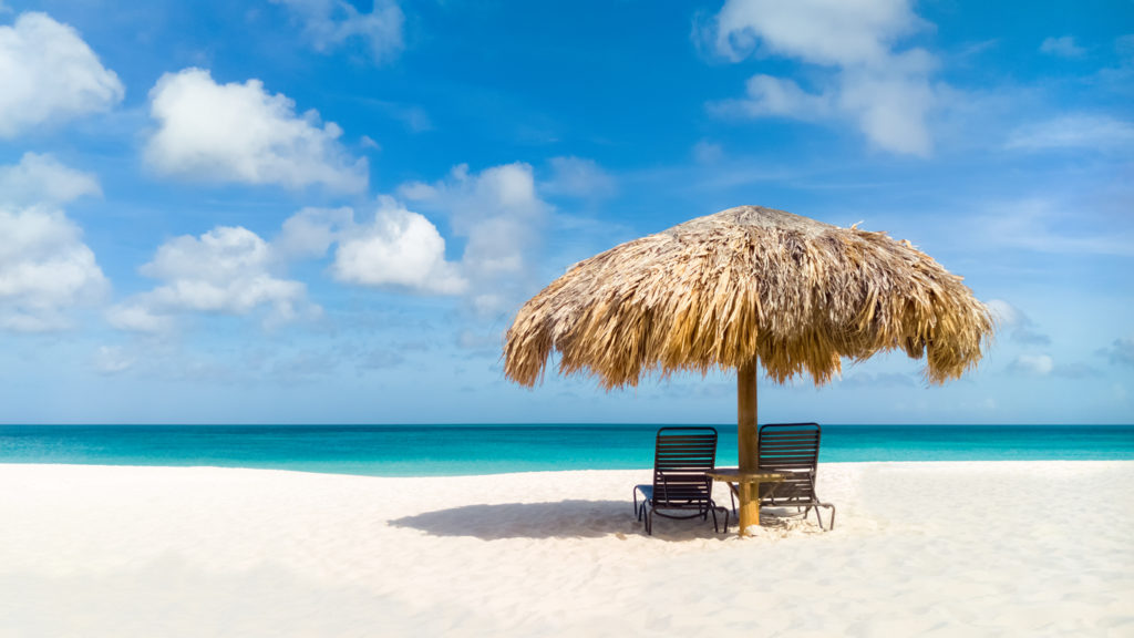 A straw umbrella on Eagle Beach, Aruba.