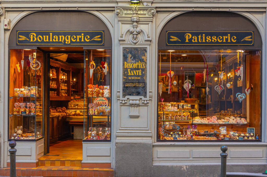 A bakery in Strasbourg showcasing Christmas biscuits and breads.