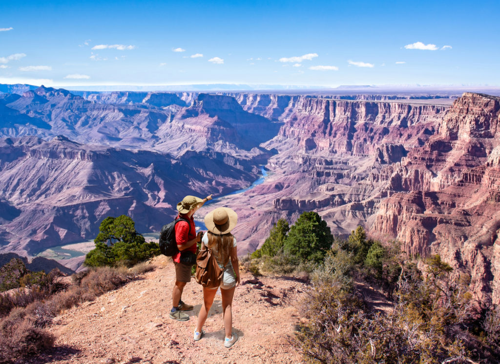 Friends hikings and enjoying the view of the Colorado river