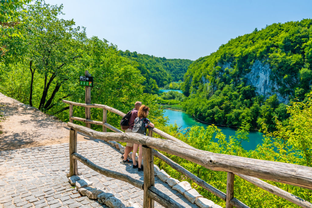 Tourists admiring the Plitvice Lakes