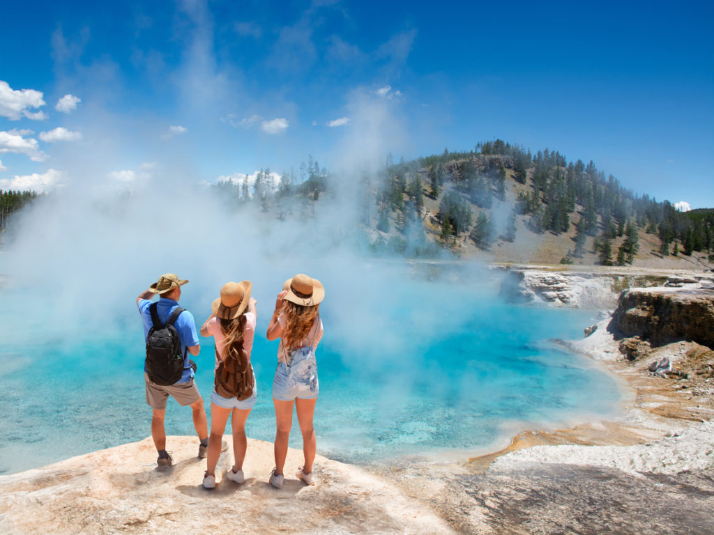 Friends on a hiking trip to Excelsior Geyser, Yellowstone National Park