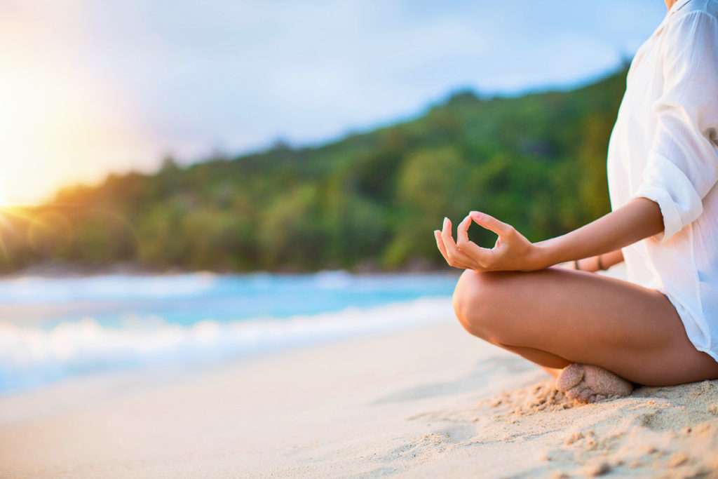 Meditating on the beach