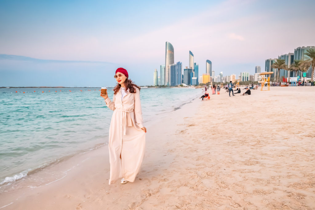 Walking along Corniche beach in Abu Dhabi