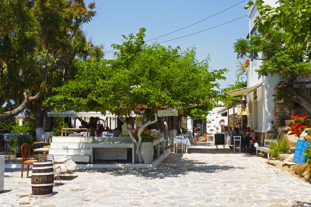 A small square full of locals on Tinos