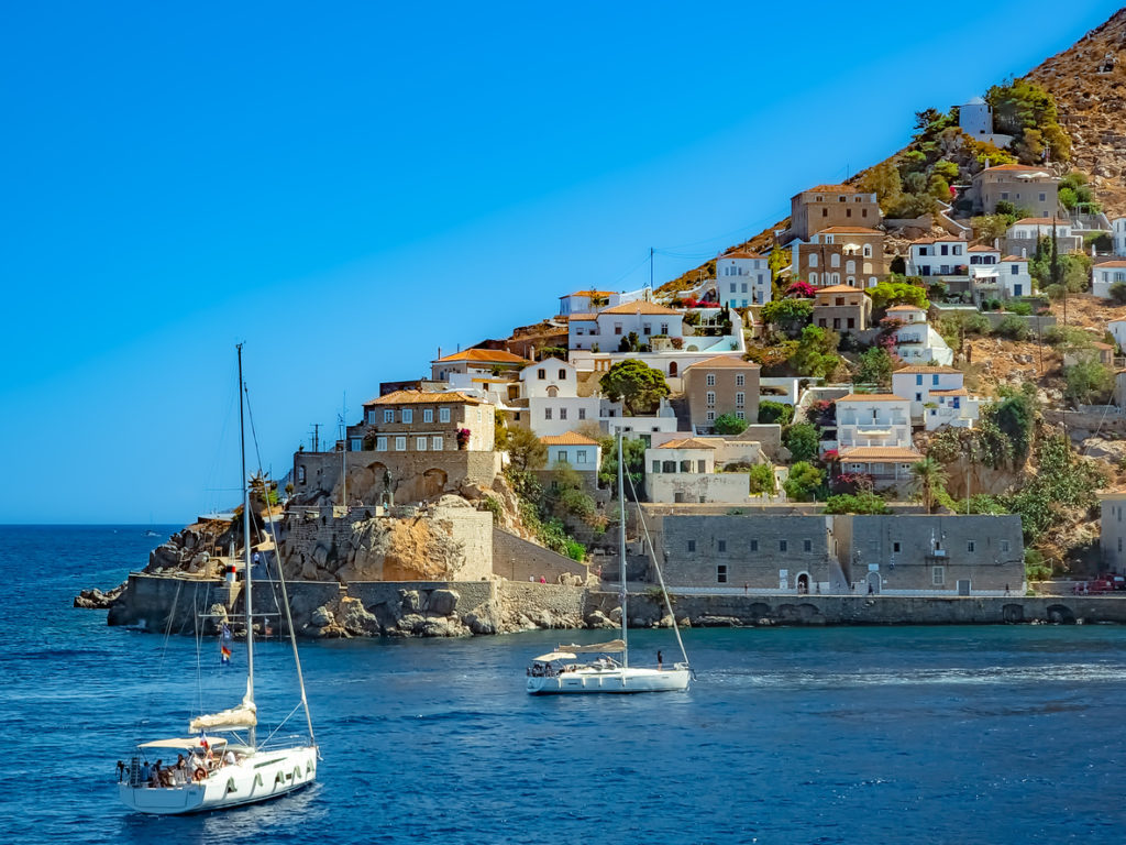 Boats sailing into the port of Hydra