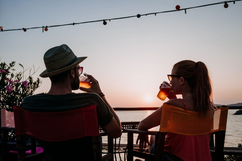 Enjoying sunset at a beach bar