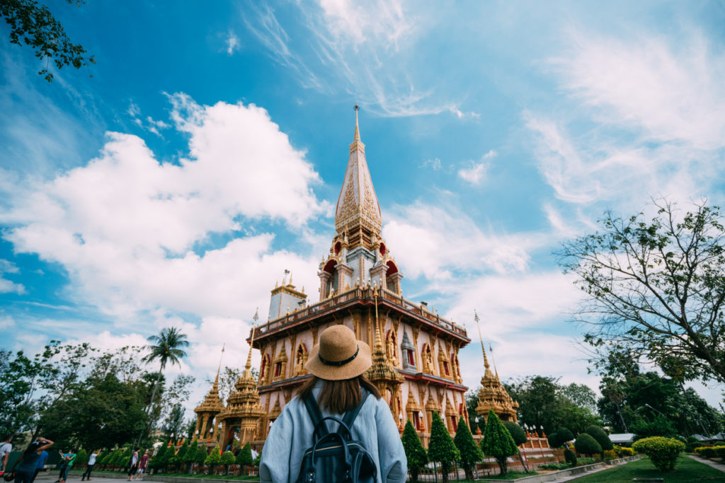 Female traveller at Chalong temple in Phuket town