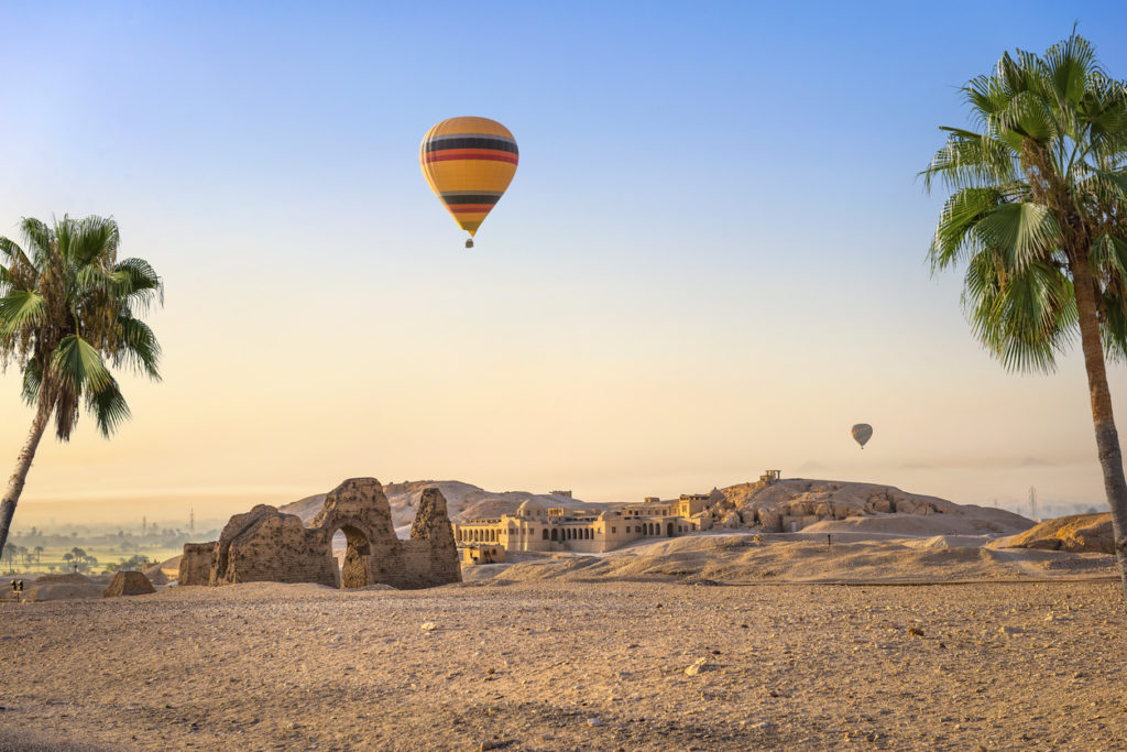 Hot air balloon over the ruins of Hatshepsut temple