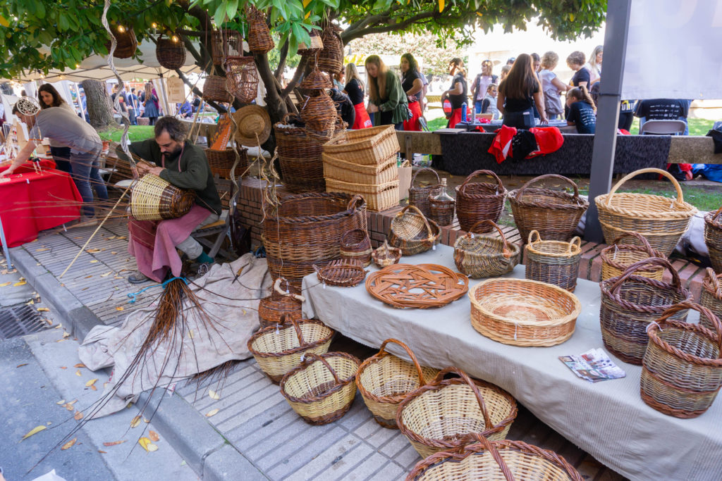 Craftsman making wicker baskets