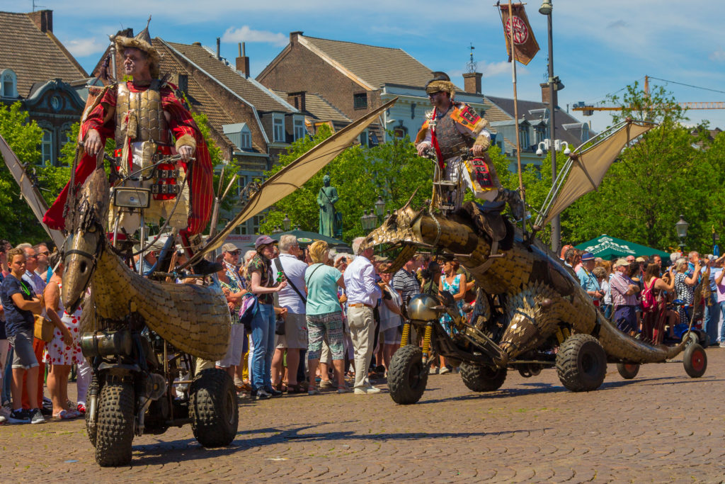 Street performance with ironwings dragons in Maastricht