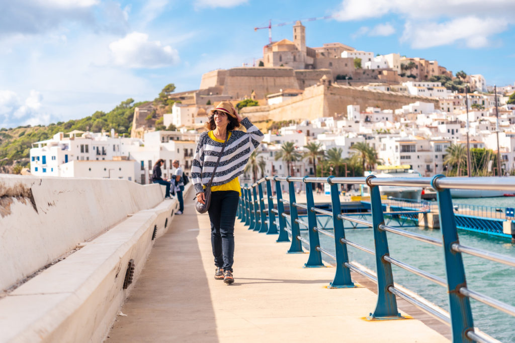 Lady visiting the coastal town of Ibiza town