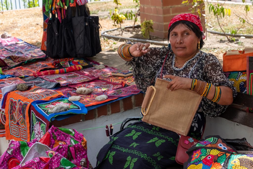 Authentic-Kuna-indian-making-her-handmade-crafts