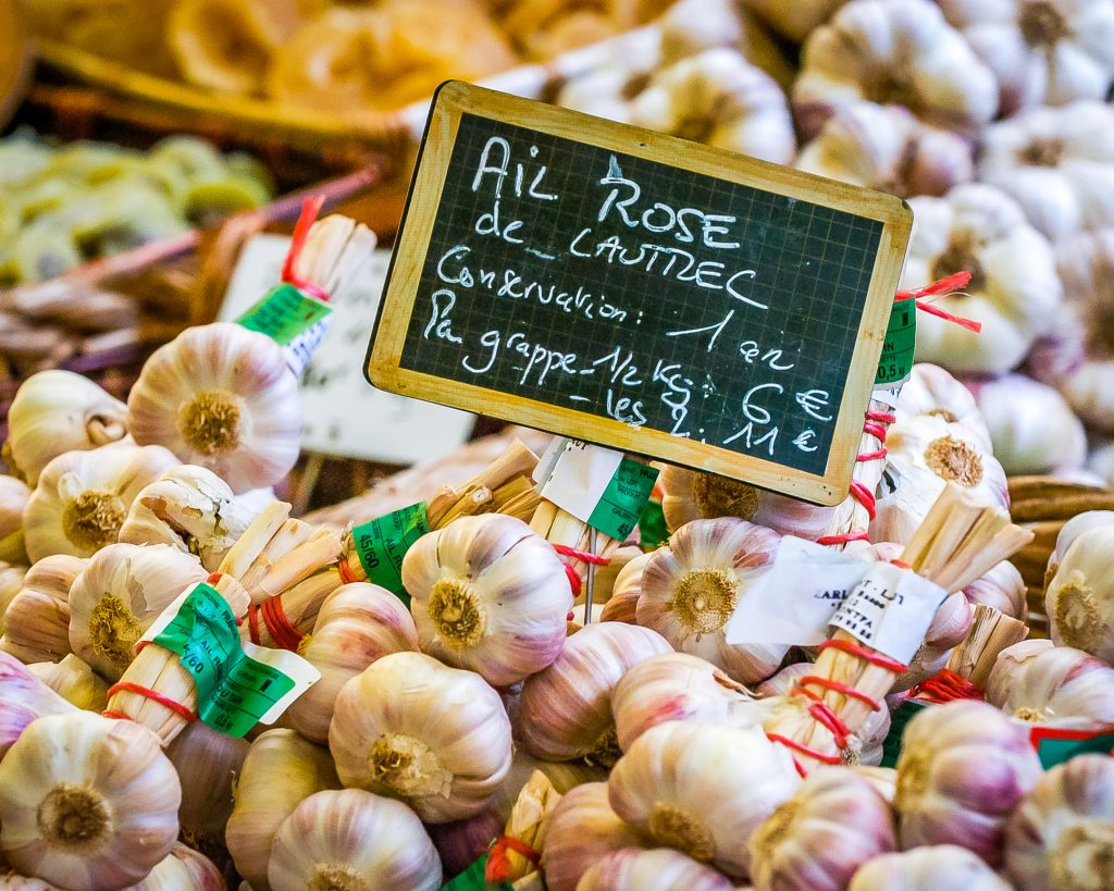 Garlic for sale in a market in L'Isle-sur-la-Sorgue